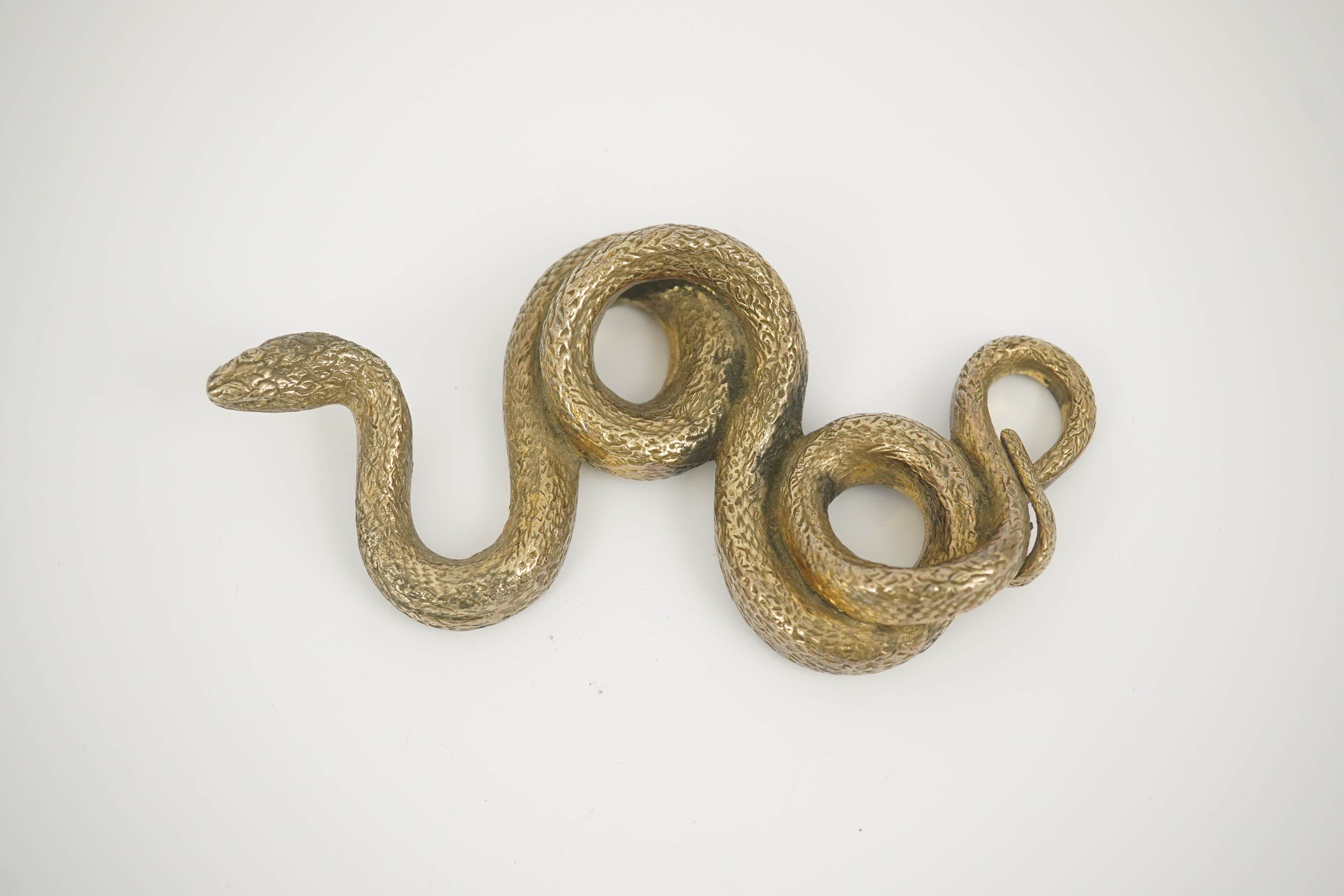 A Sterling silver gilt model of a snake, stamped PR.S